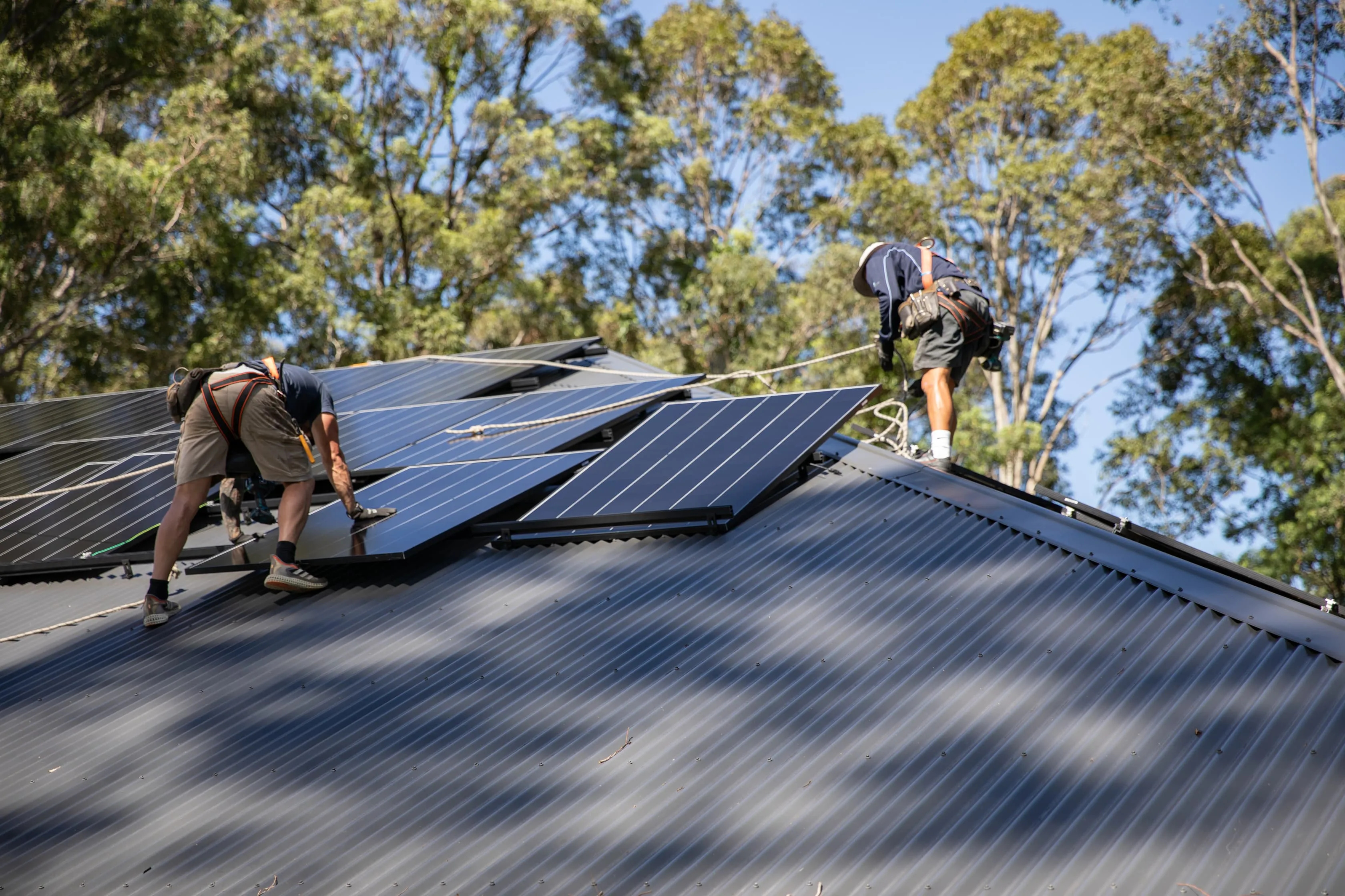 Installer completing a rooftop solar job